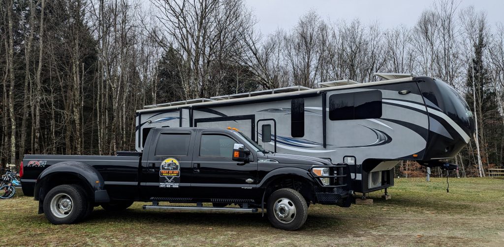 Image of the That RV Guy RV and the truck that pulls it.